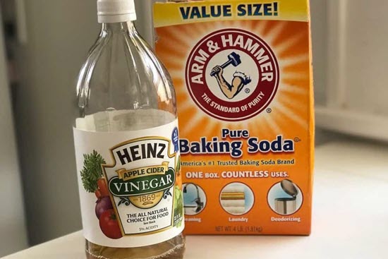 use vinegar and baking soda to remove bleach stains